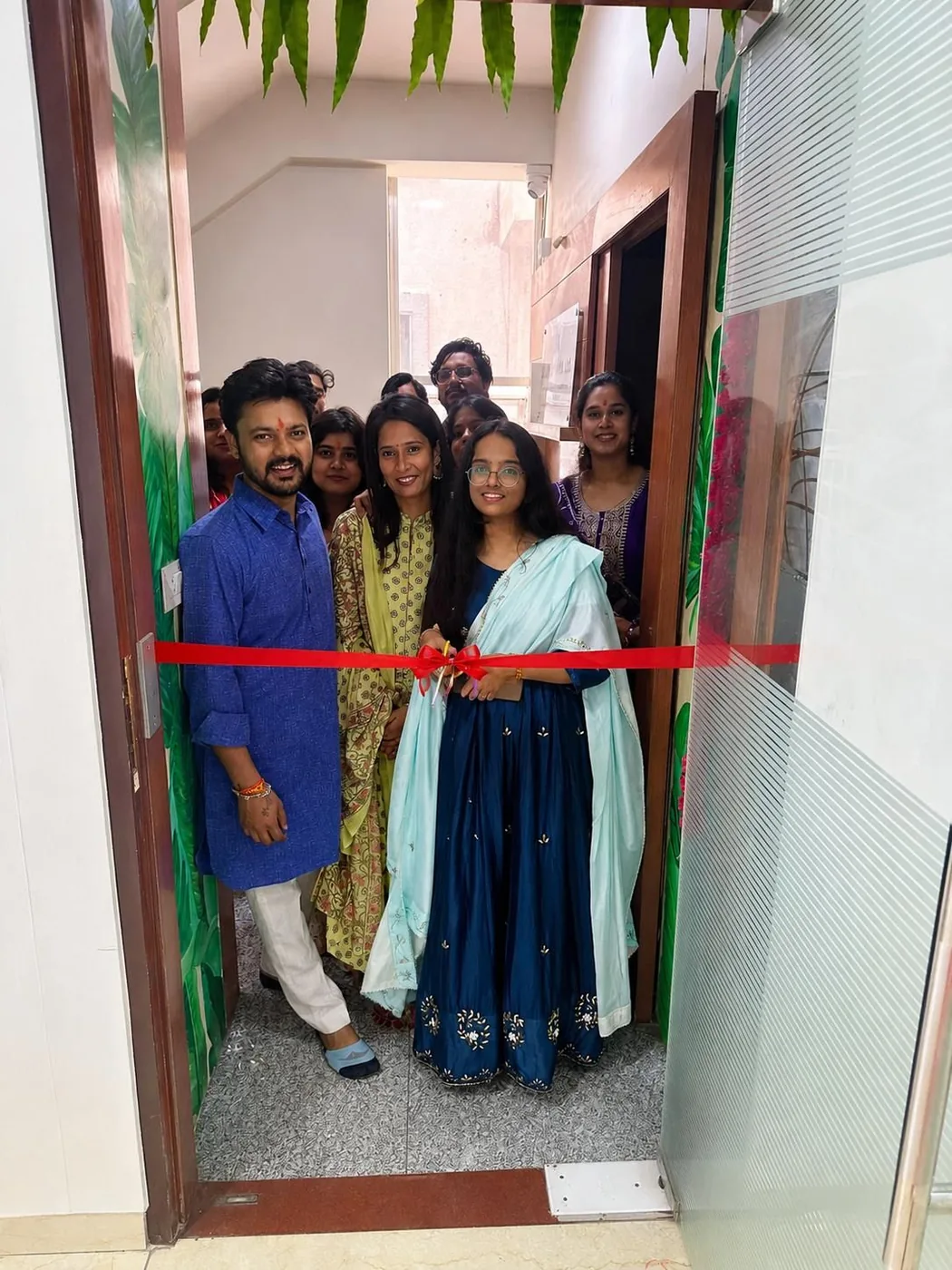 MLE Systems office inauguration ribbon cutting